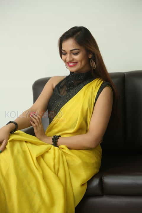 Actress Aswini Beautiful Yellow Saree Photos 51