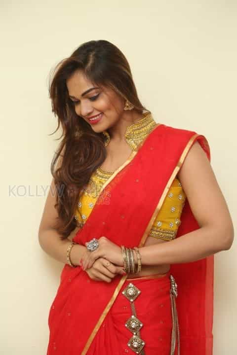 Tollywood Beauty Aswini Red Saree Photos 03