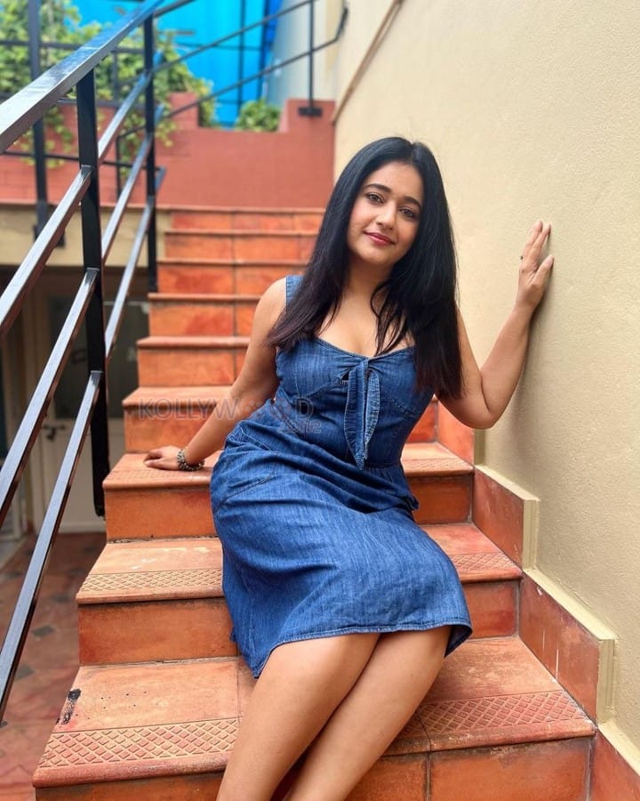 Actress Poonam Bajwa in a Denim Skirt Photos 03