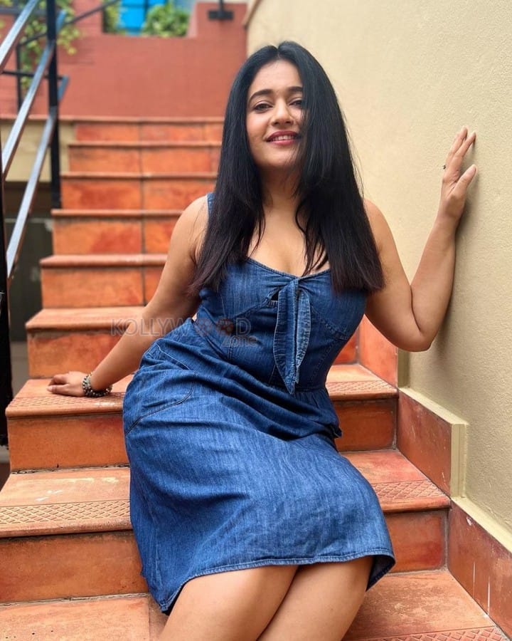 Actress Poonam Bajwa in a Denim Skirt Photos 04