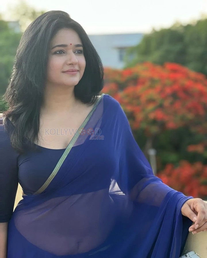 Captivating Poonam Bajwa Cleavage in a Blue Saree with Matching Blouse Photos 06