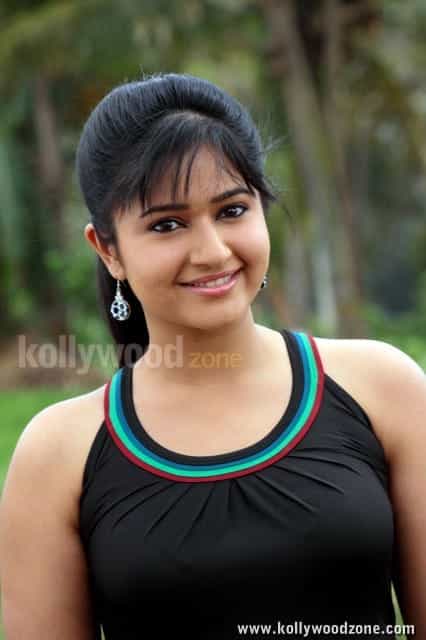 Manthrikan Heroine Poonam Bajwa Cute Stills 03