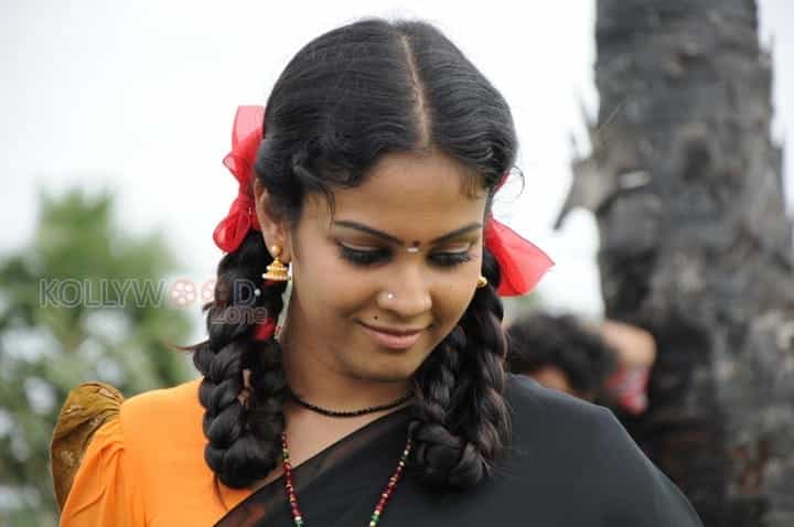 Porkuthirai Movie Heroine Chandini Photos 14