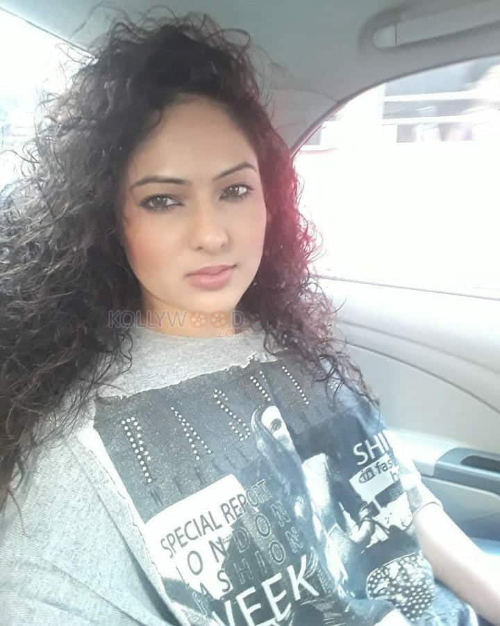 Actress Nikesha Patel Candid Pictures 13