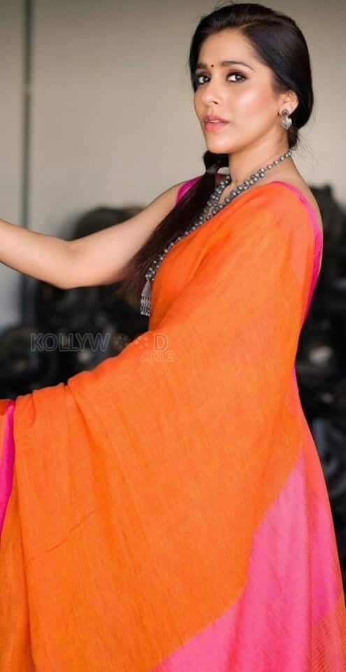 Tollywood Actress Rashmi Gautam in an Orange Saree Photos 02