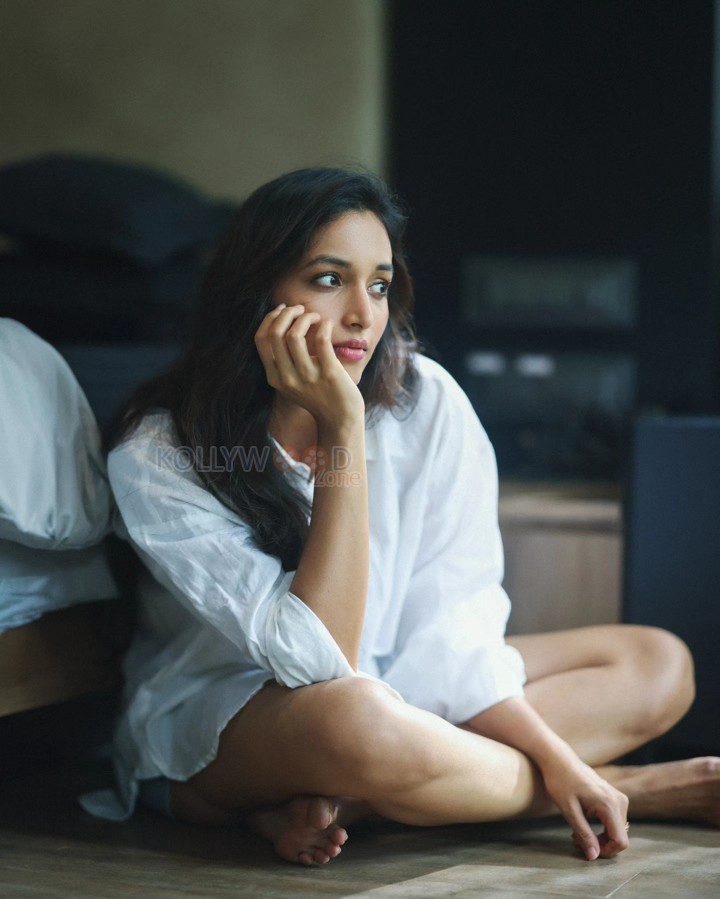 Telusu Kada Heroine Srinidhi Shetty in a White Shirt and Tiny Shorts Photos 02