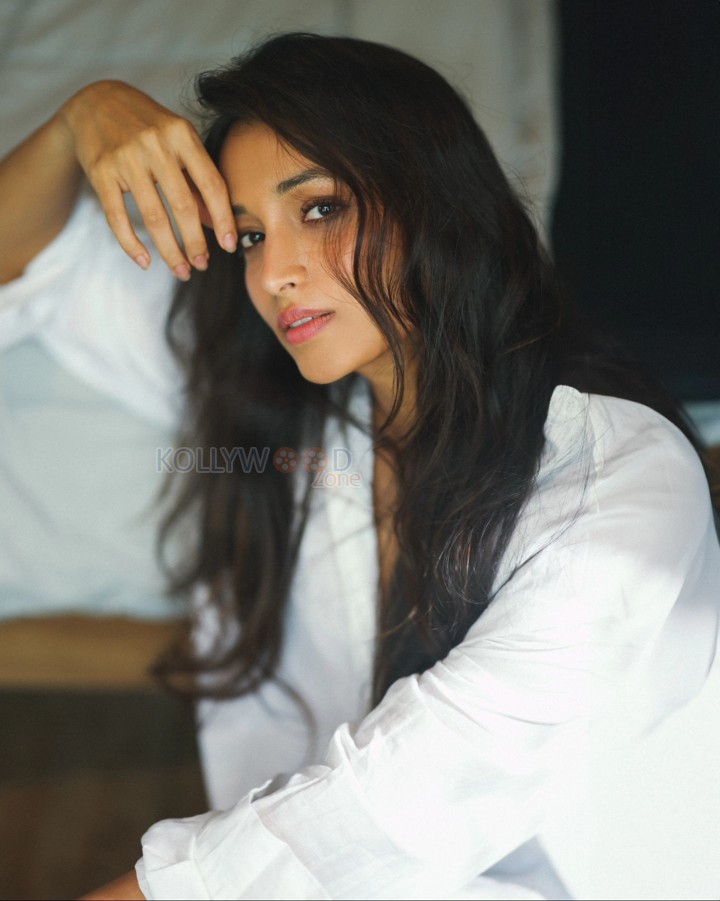 Telusu Kada Heroine Srinidhi Shetty in a White Shirt and Tiny Shorts Photos 04