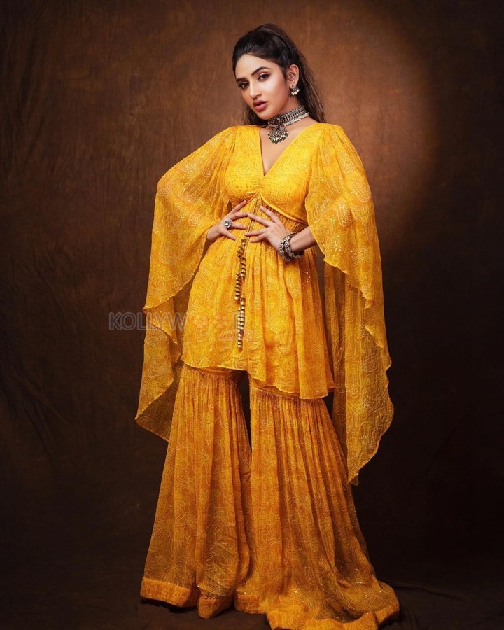 Adorable Sreeleela in a Yellow Shahara Dress Pictures 04