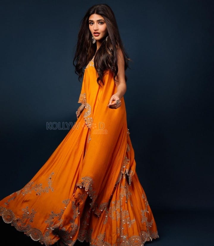 Beautiful Sreeleela in an Orange Embroidered Lehenga Set Photos 02