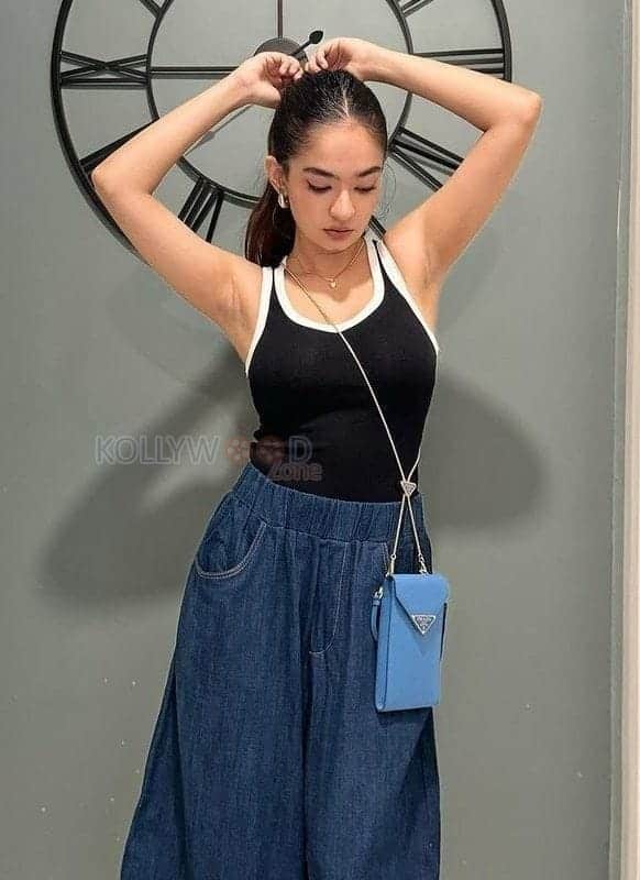 Anushka Sen in a Long Blue Denim Skirt and Black Sleeveless Top Picture 01