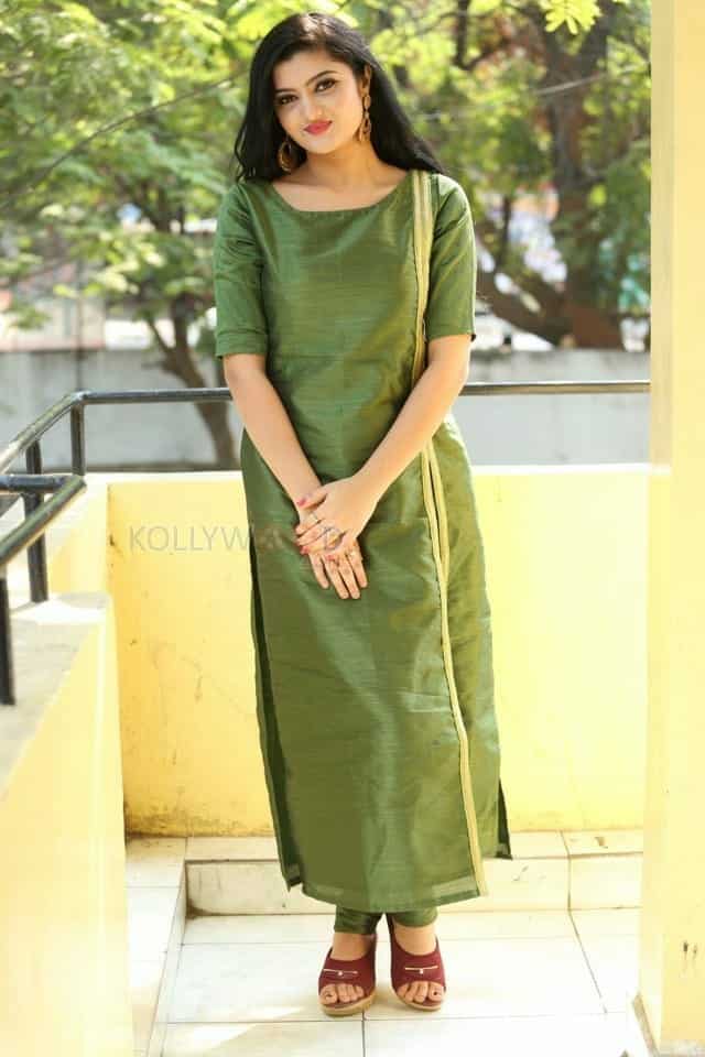 Actress Akshita Green Dress Photos 09