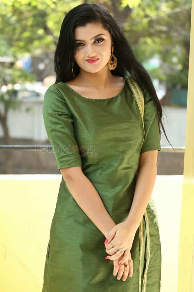 Actress Akshita Green Dress Photos 13