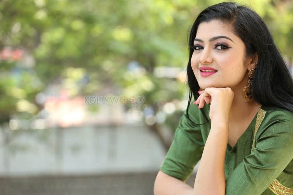 Actress Akshita Green Dress Photos 16