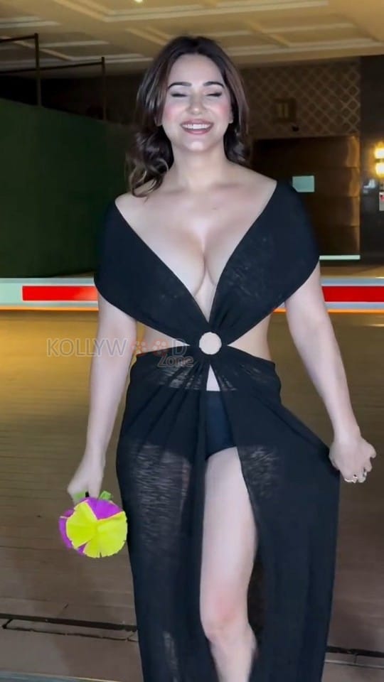 Glamorous Kangana Sharma in a Cleavage Boobs Revealing Black Dress Photos 01