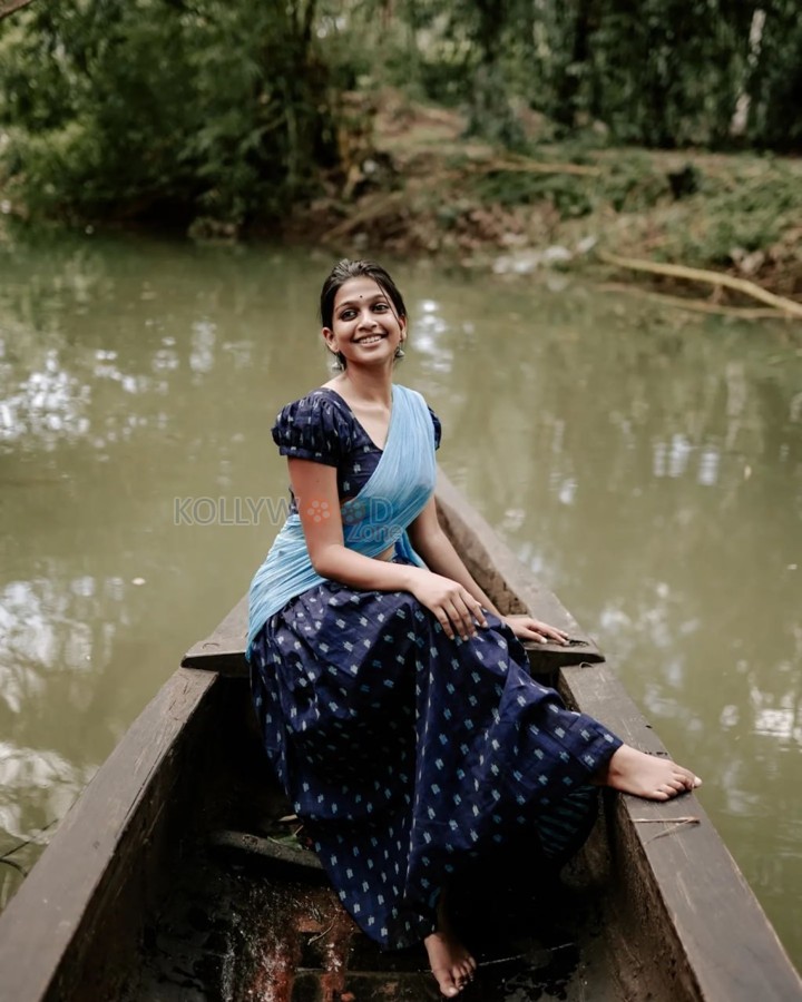 Beautiful Ananthika Sanilkumar in a Light Blue Half Saree with a Print Blouse and Skirt Pictures 01