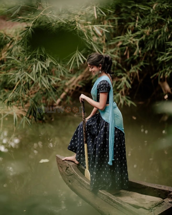 Beautiful Ananthika Sanilkumar in a Light Blue Half Saree with a Print Blouse and Skirt Pictures 03