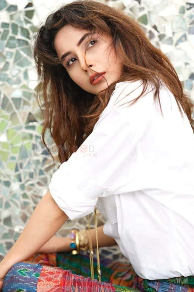 Stunning Shehnaaz Gill in a White Shirt and Multicolor Pants Photoshoot Pictures 01