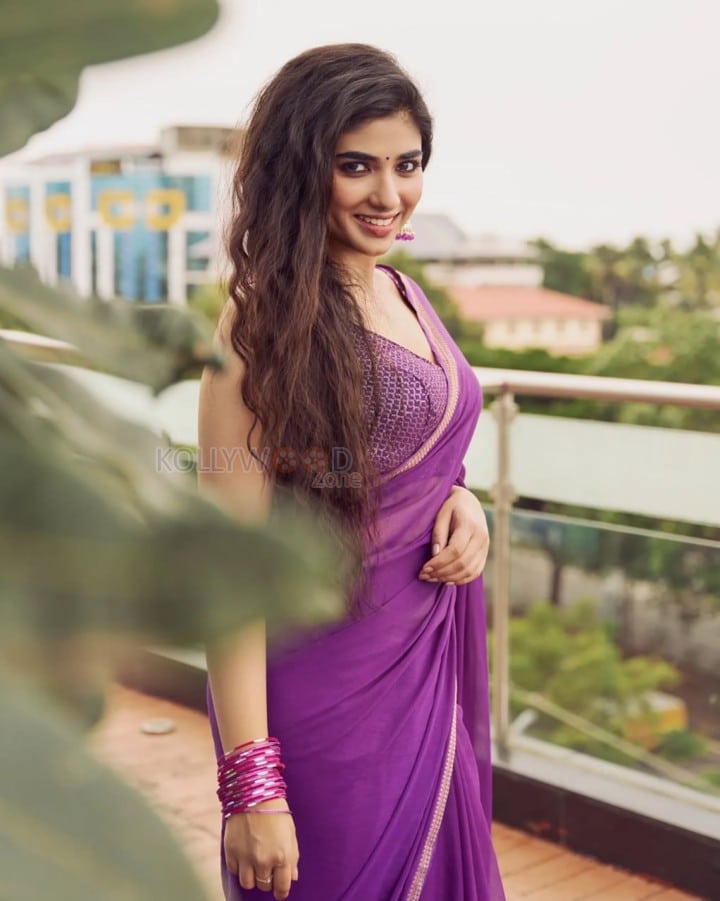 Attractive Pragya Nagra in a Purple Saree with Sleeveless Blouse Photos 04