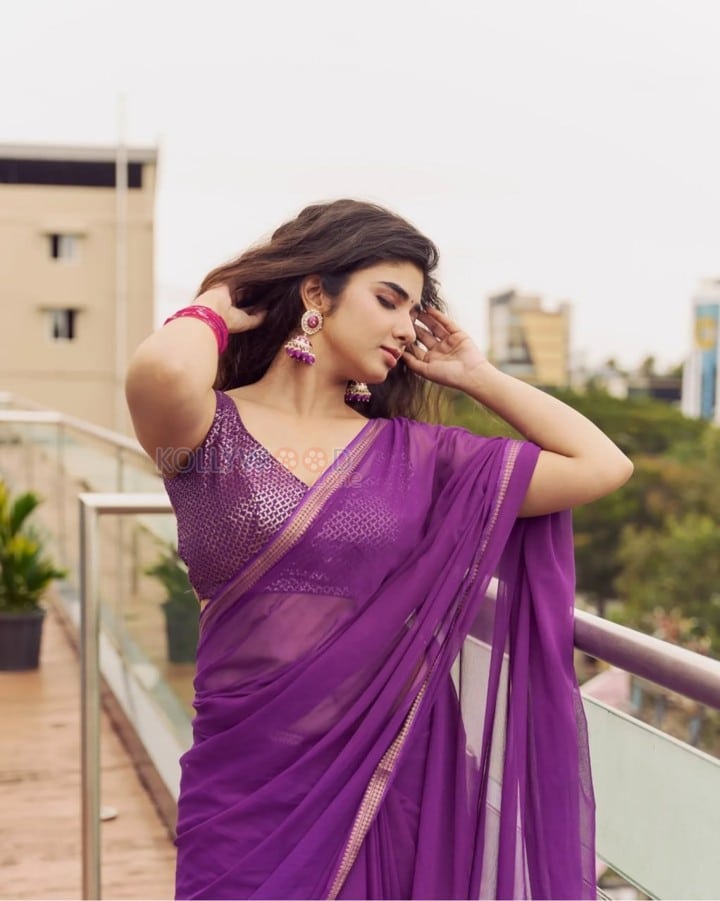 Attractive Pragya Nagra in a Purple Saree with Sleeveless Blouse Photos 05