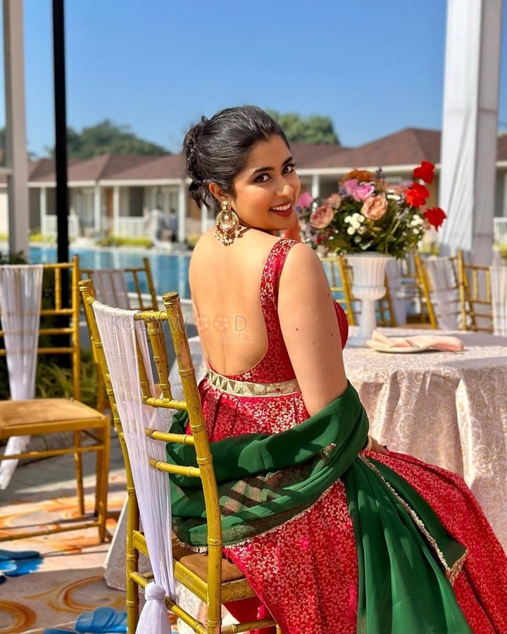 Curvy Beauty Nikita Sharma in a Red Zarisha Suit Photoshoot Stills 01