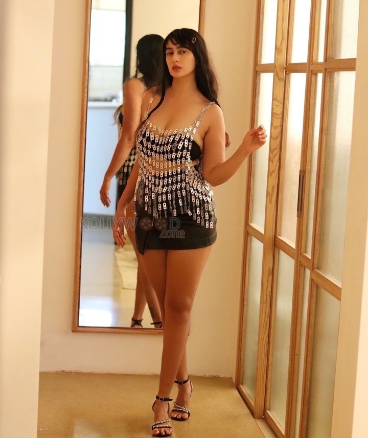 Adorable Megha Shukla in Satin Black Mini Skirt and Black Tube Top Pictures 06