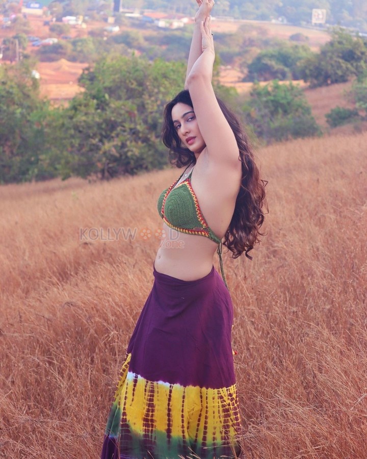 Captivating Megha Shukla in a Green Bra and Purple Skirt Photos 01