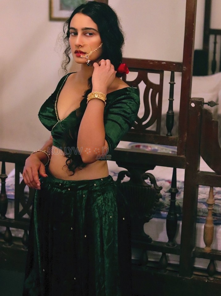 Flawless Megha Shukla in a Green Lehenga Photos 01