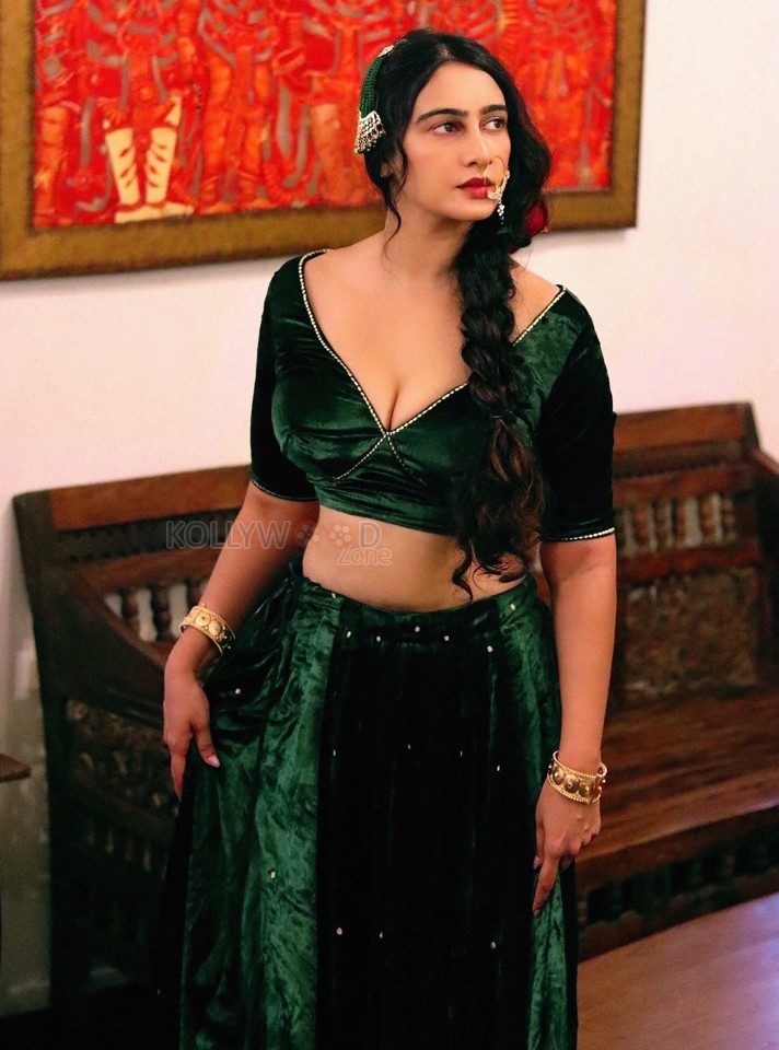 Flawless Megha Shukla in a Green Lehenga Photos 02