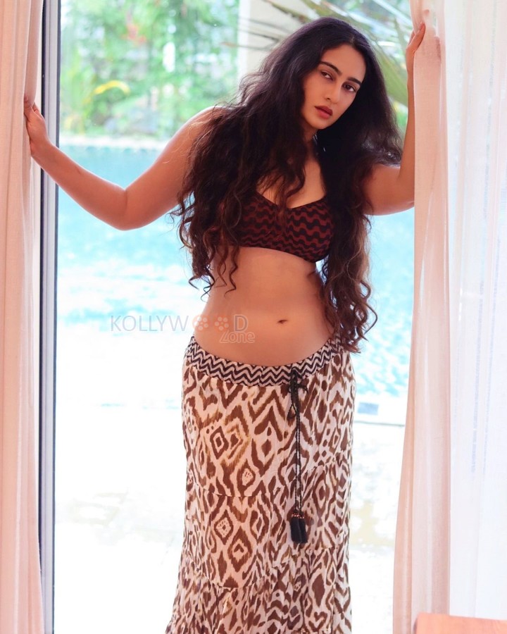 Glamorous Megha Shukla in a Brown Bralette and Full Length Skirt Photos 01