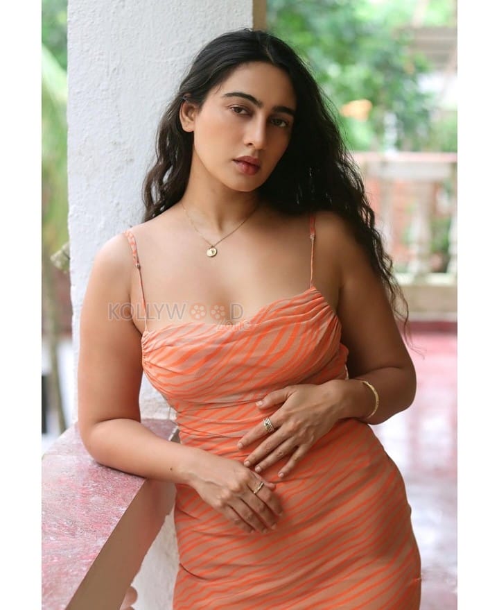 Hot and Sexy Megha Shukla in an Orange Bodycon Dress Pictures 07