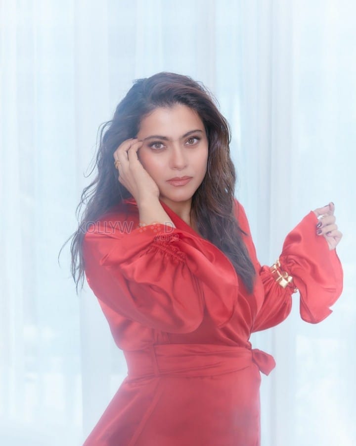 Stunning Kajol in a Red Satin Wrap Dress Photos 01