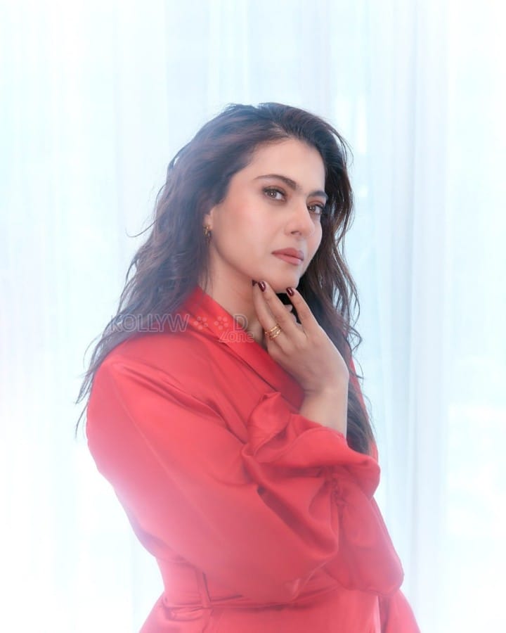 Stunning Kajol in a Red Satin Wrap Dress Photos 04