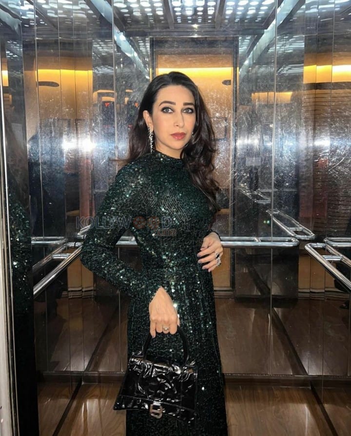 Actress Karisma Kapoor in a Green Sequin Dress Photos 01