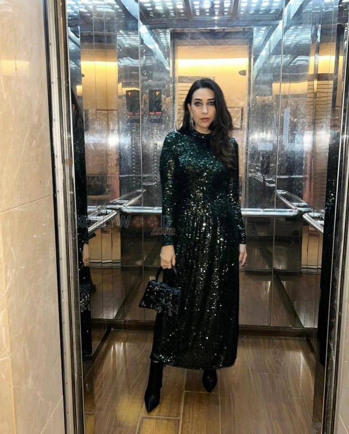 Actress Karisma Kapoor in a Green Sequin Dress Photos 06