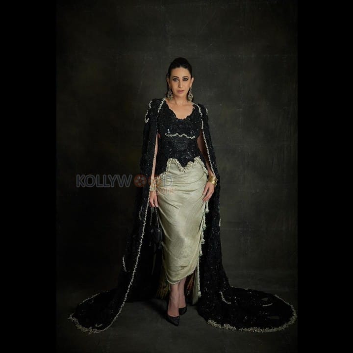 Stunning Karisma Kapoor in a Black and Silver Bodycon Dress Photos 02