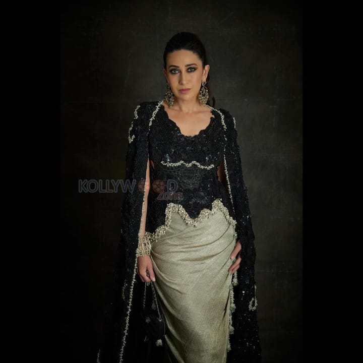 Stunning Karisma Kapoor in a Black and Silver Bodycon Dress Photos 03