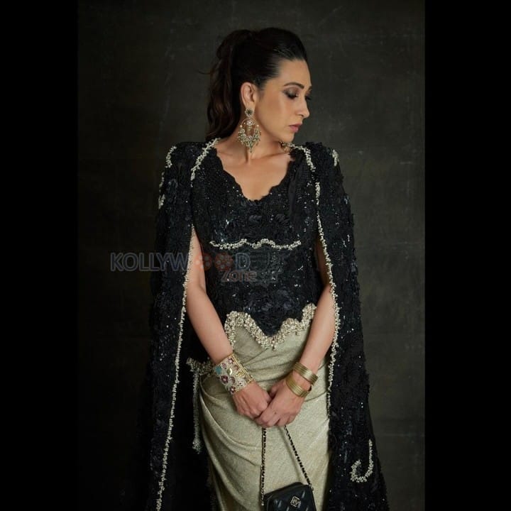 Stunning Karisma Kapoor in a Black and Silver Bodycon Dress Photos 04