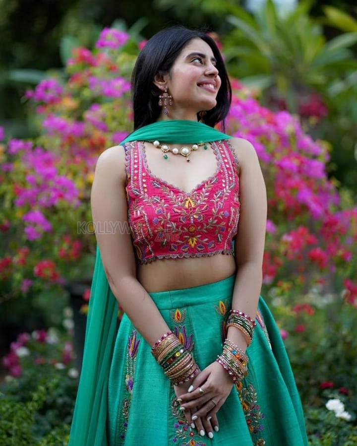 Actress Kushita Kappullu in a Green Printed Lehenga with a Red Blouse Photos 05