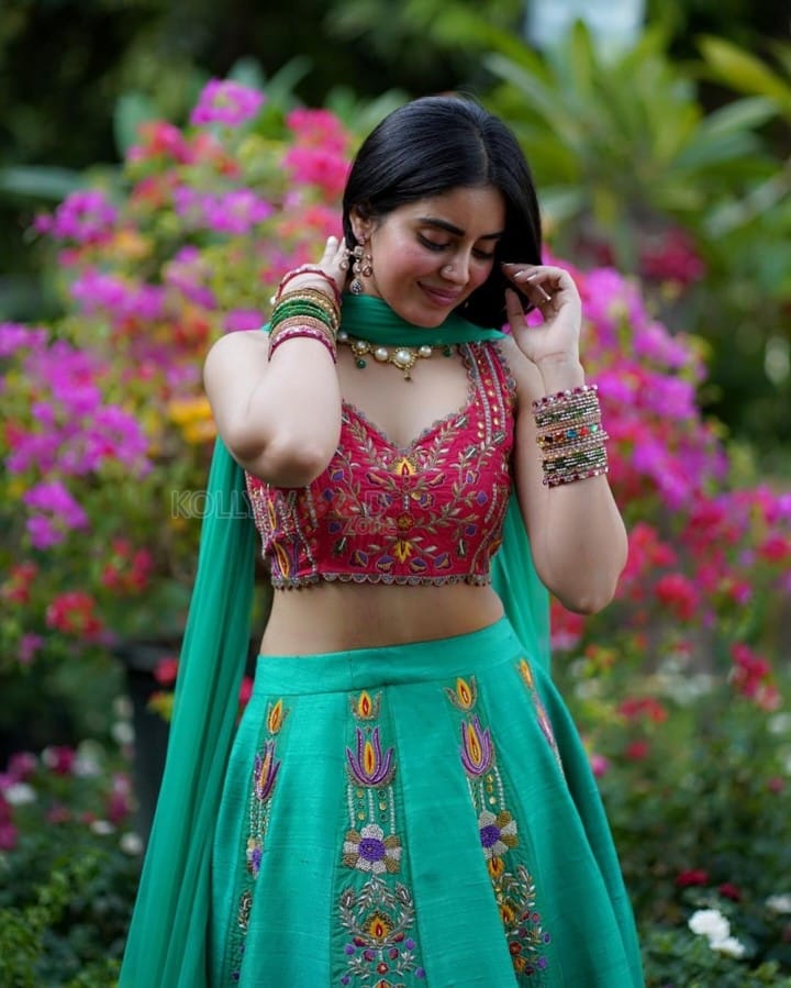 Actress Kushita Kappullu in a Green Printed Lehenga with a Red Blouse Photos 07