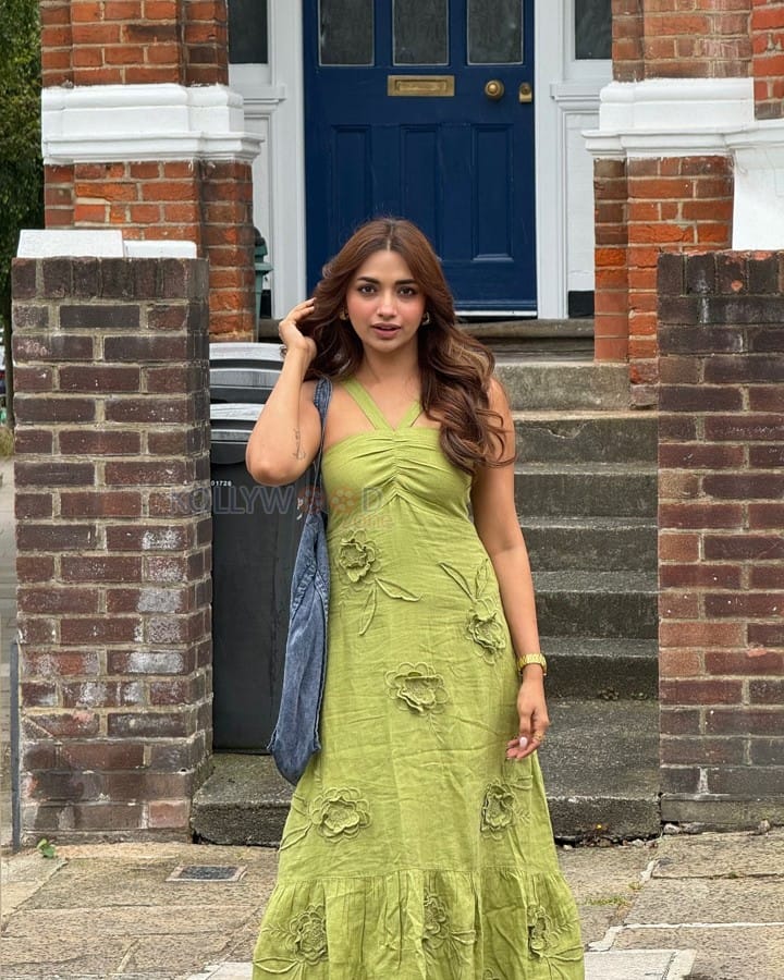 Beautiful Jiya Shankar in an Olive Midi Dress outside The Market Coffee House and Bar in London Photos 01