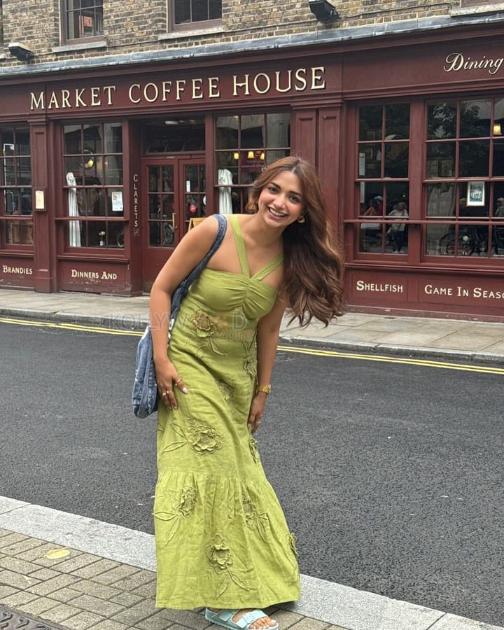 Beautiful Jiya Shankar in an Olive Midi Dress outside The Market Coffee House and Bar in London Photos 02