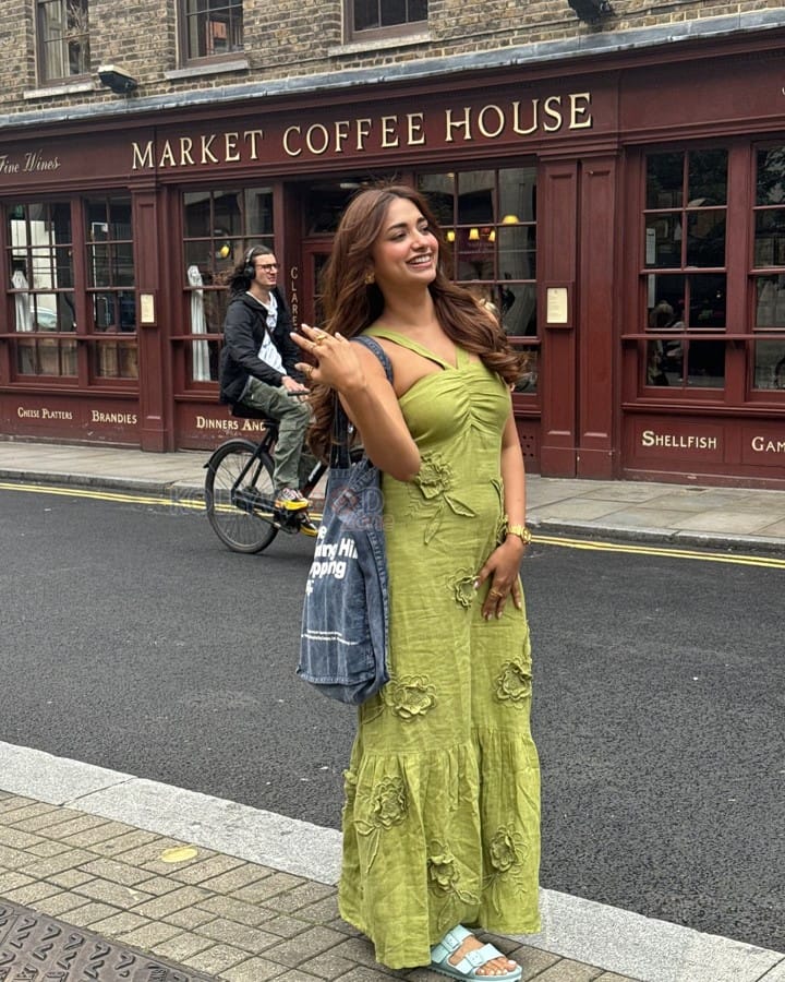 Beautiful Jiya Shankar in an Olive Midi Dress outside The Market Coffee House and Bar in London Photos 04