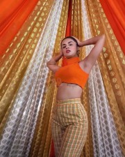 Bombshell Avneet Kaur in a Stylish Orange Sleeveless Crop Top with a High Waist Pants Photos 01