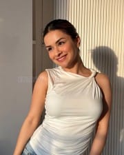 Casual Beauty Avneet Kaur in a White Dress Photos 01