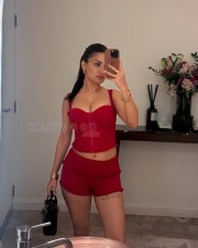 Hot Avneet Kaur in a Red Corset Top and Red Mini Shorts Photos 01