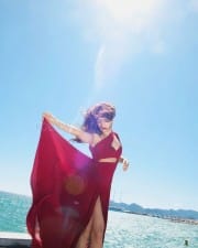 Red Hot Avneet Kaur in a Maroon Dress at French Riviera Photos 04