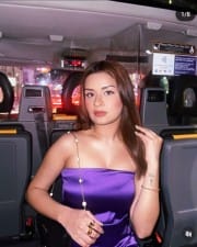 Sexy Avneet Kaur in a Black Taxi wearing a Purple Strapless Dress Pictures 01