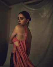 Actress Ananya Panday in a Coral Silk Chiffon Choli Top and Black Crepe Crossover Pants Photos 01