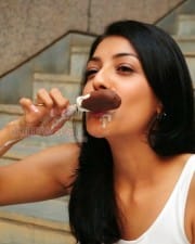 Actress Kajal Agarwal Licking And Sucking Ice Cream Photos