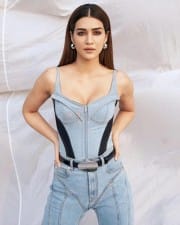 Actress Kriti Sanon in a Denim Zip Bodysuit Photos 01